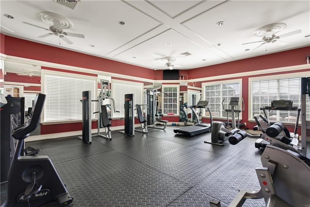 Exercise room with ceiling fan