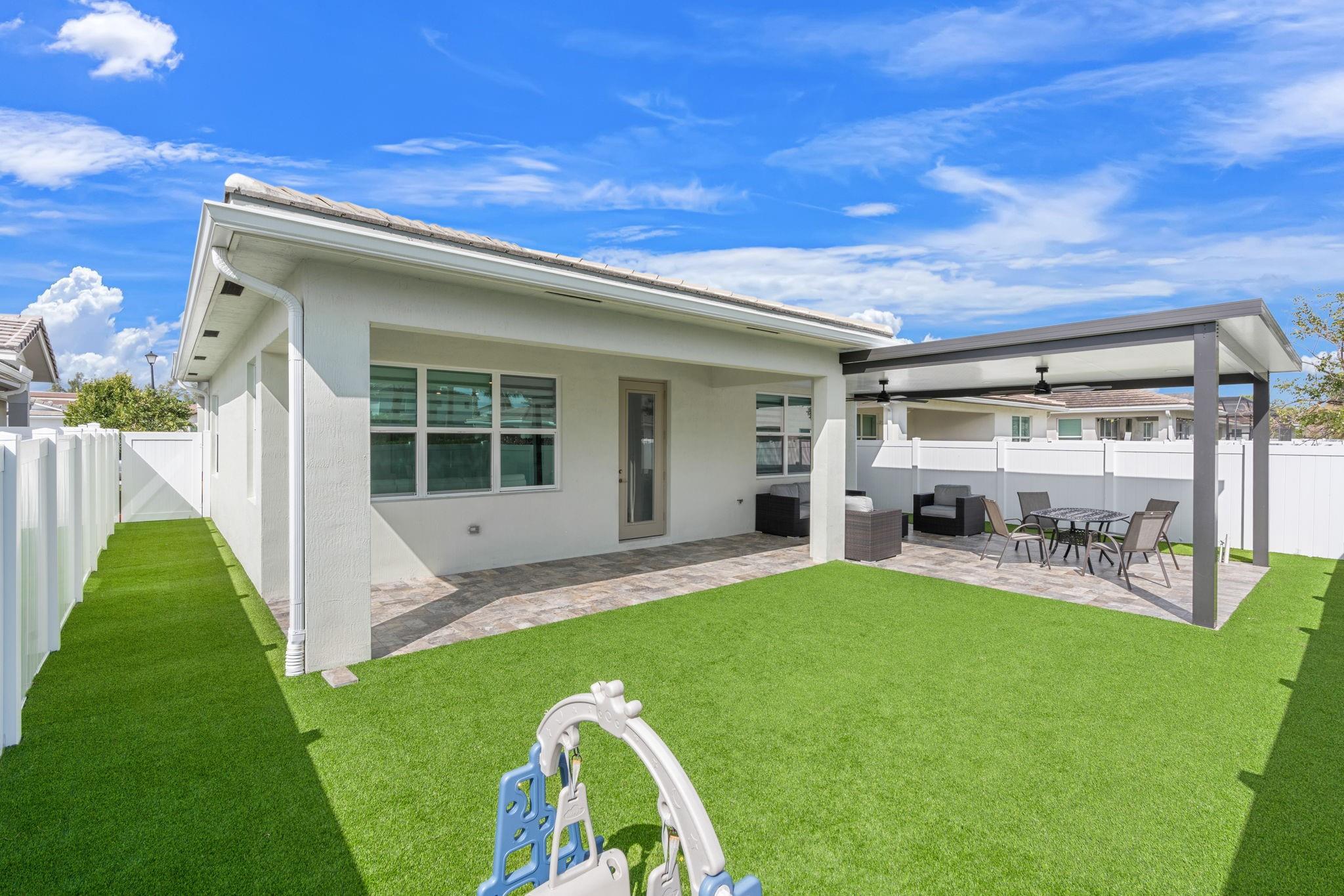 Fully Fenced Backyard with Side yard for Pets and Equipment