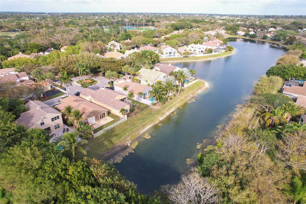 Photo for 6890 NW 75th Court, Parkland, FL 33067 - Listing #FX-10427148 private pool home positioned on canal in gated community.