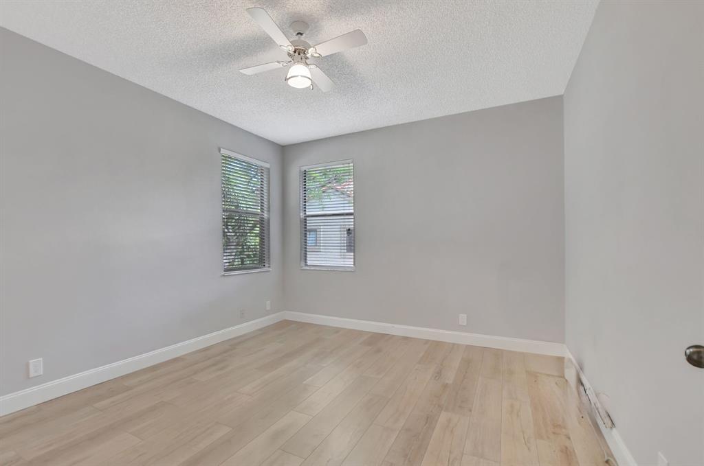 Photo for 5801 Coach House Circle, Unit E, Boca Raton, FL 33486 - Listing #FX-10436780 Big BR 3 is a corner and has gorgeous wood floors.