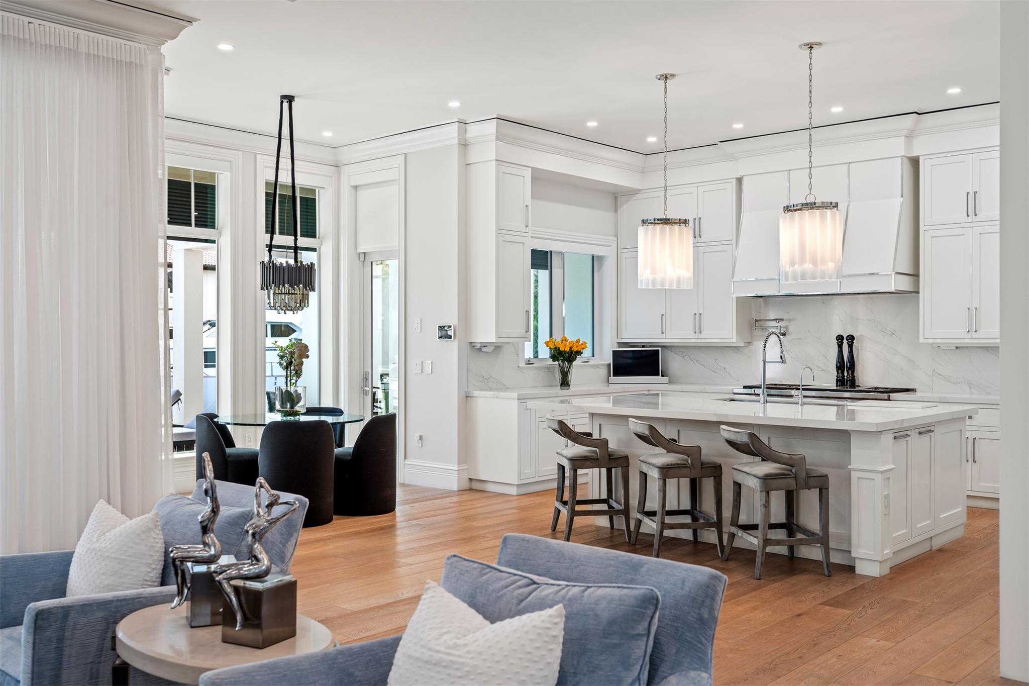 A chef's dream! Equipped with Sub-Zero and Wolf appliances. Overlook your main living space while eating and cooking.