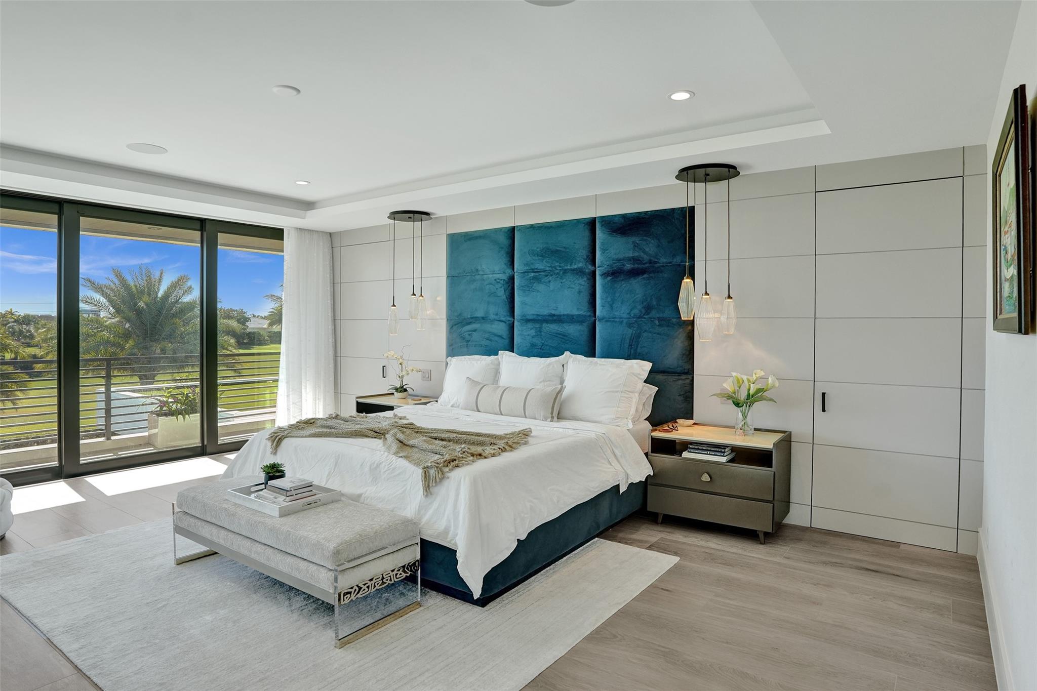 Master bedroom with integrated panel doors for gym and man's walk in closet