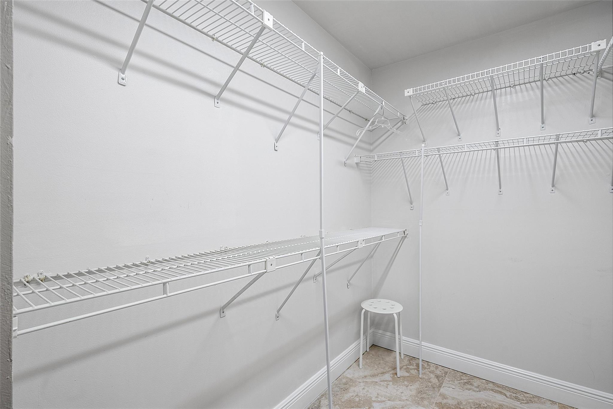 Large walk in closet in Primary bedroom suite