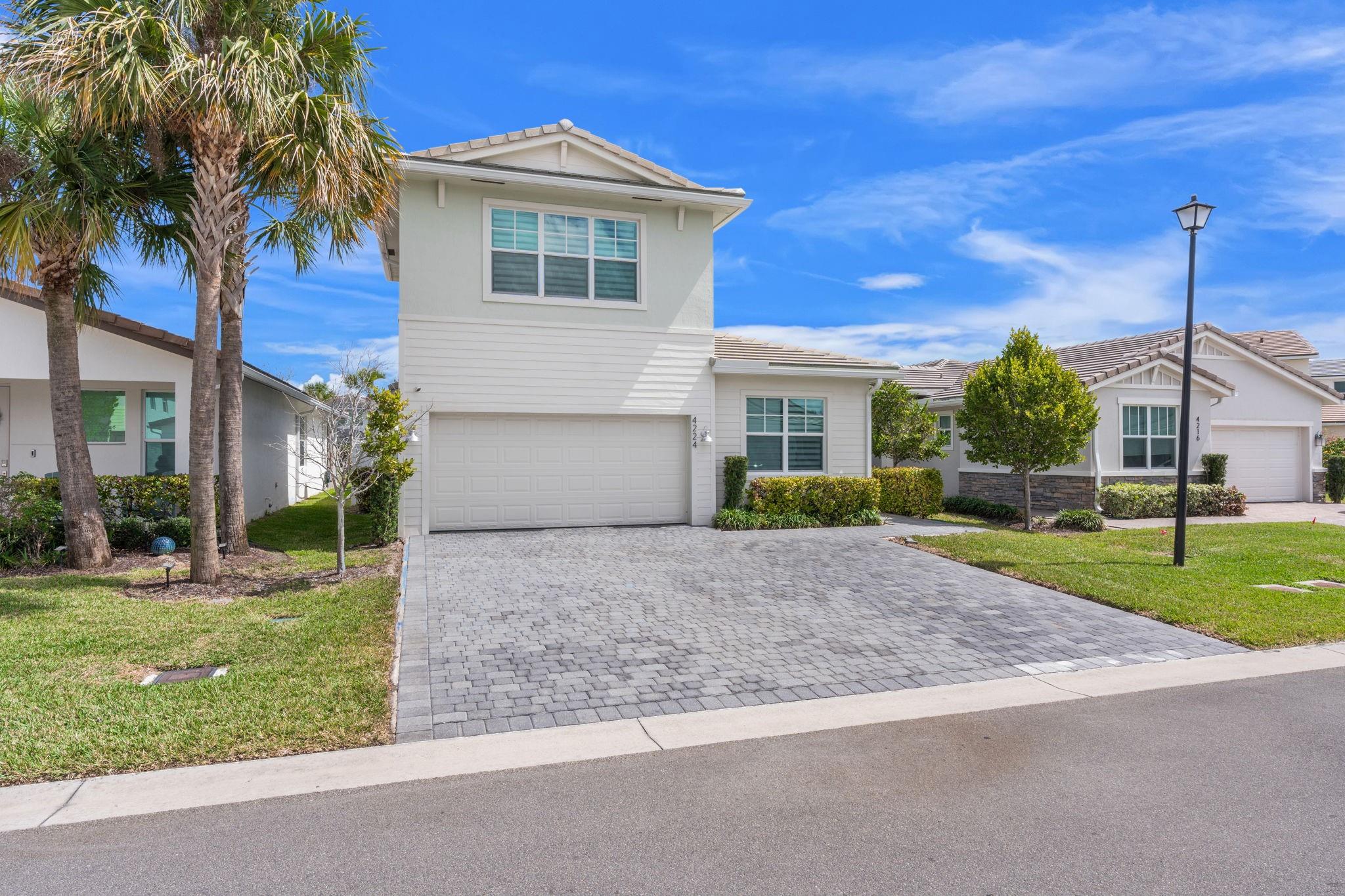 Expanded Paver Driveway Allows for 3 Vehicles in the Driveway including Trucks. Pavers Continue on the Walkway to the Front Door.