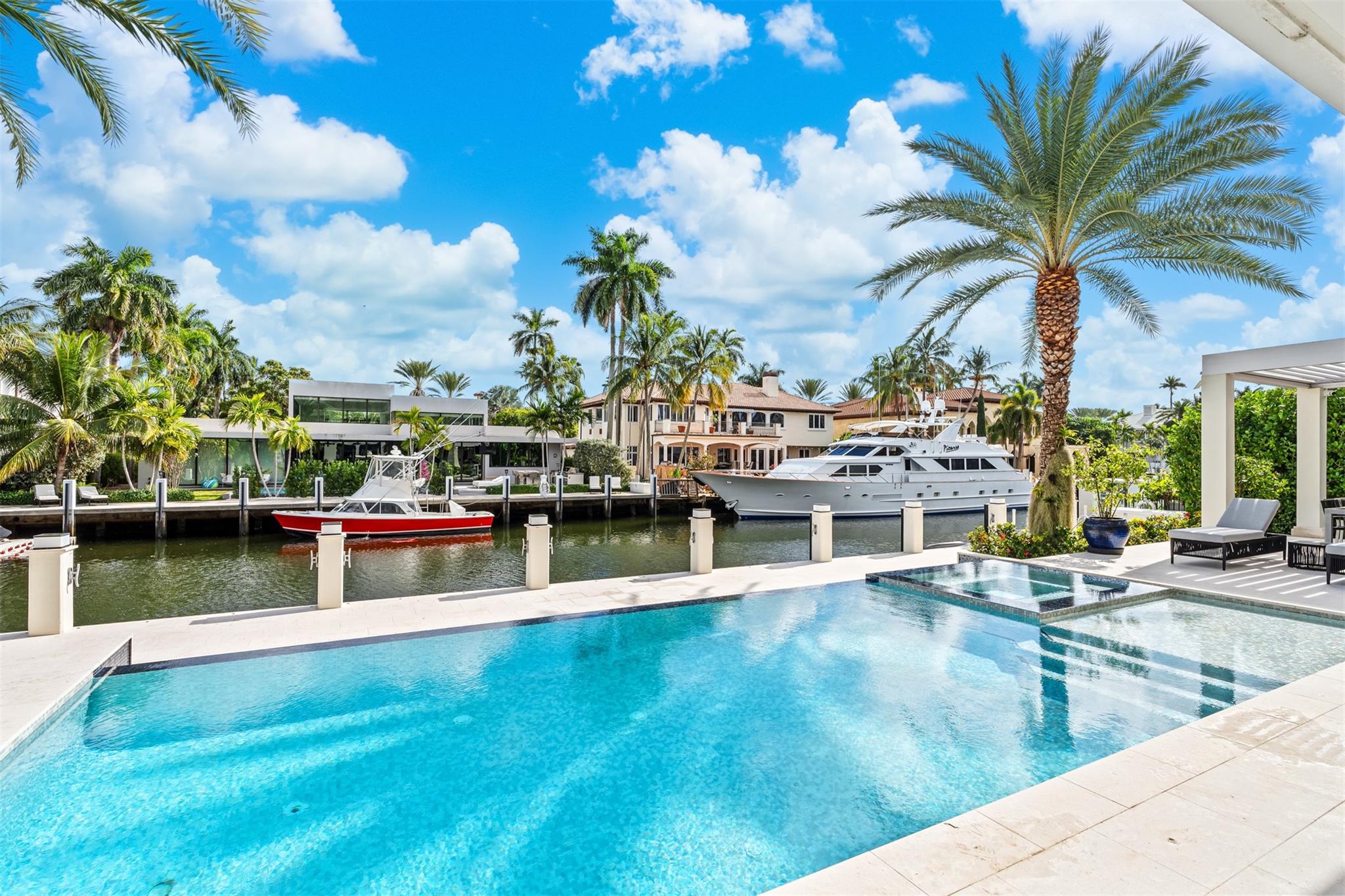 Enjoy waterfront views from your heated, saltwater pool.