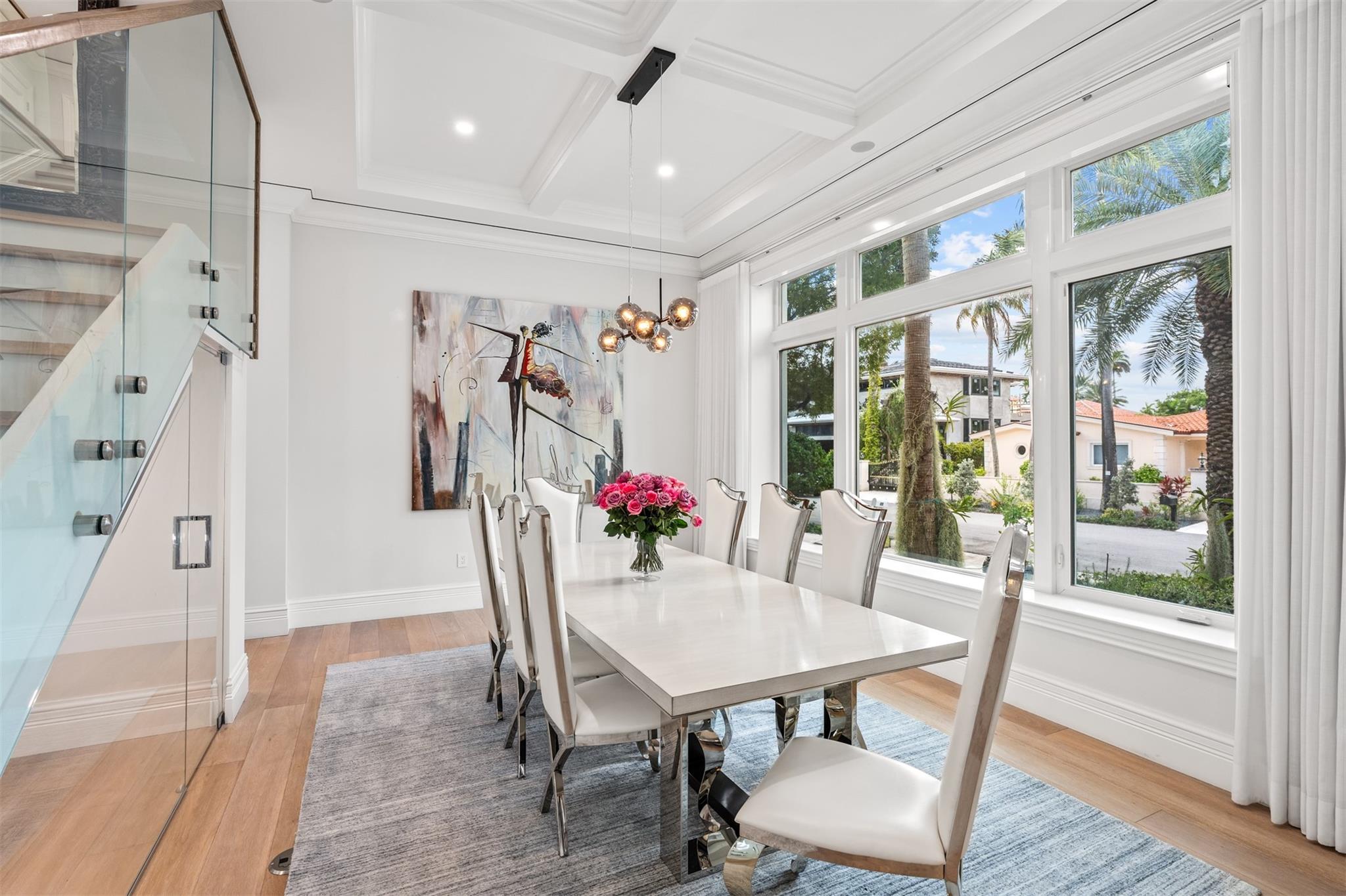 Large dinning room overlooking the wine cabinet.
