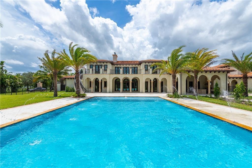 VIEW FROM POOL OF THE BACK OF THE HOUSE