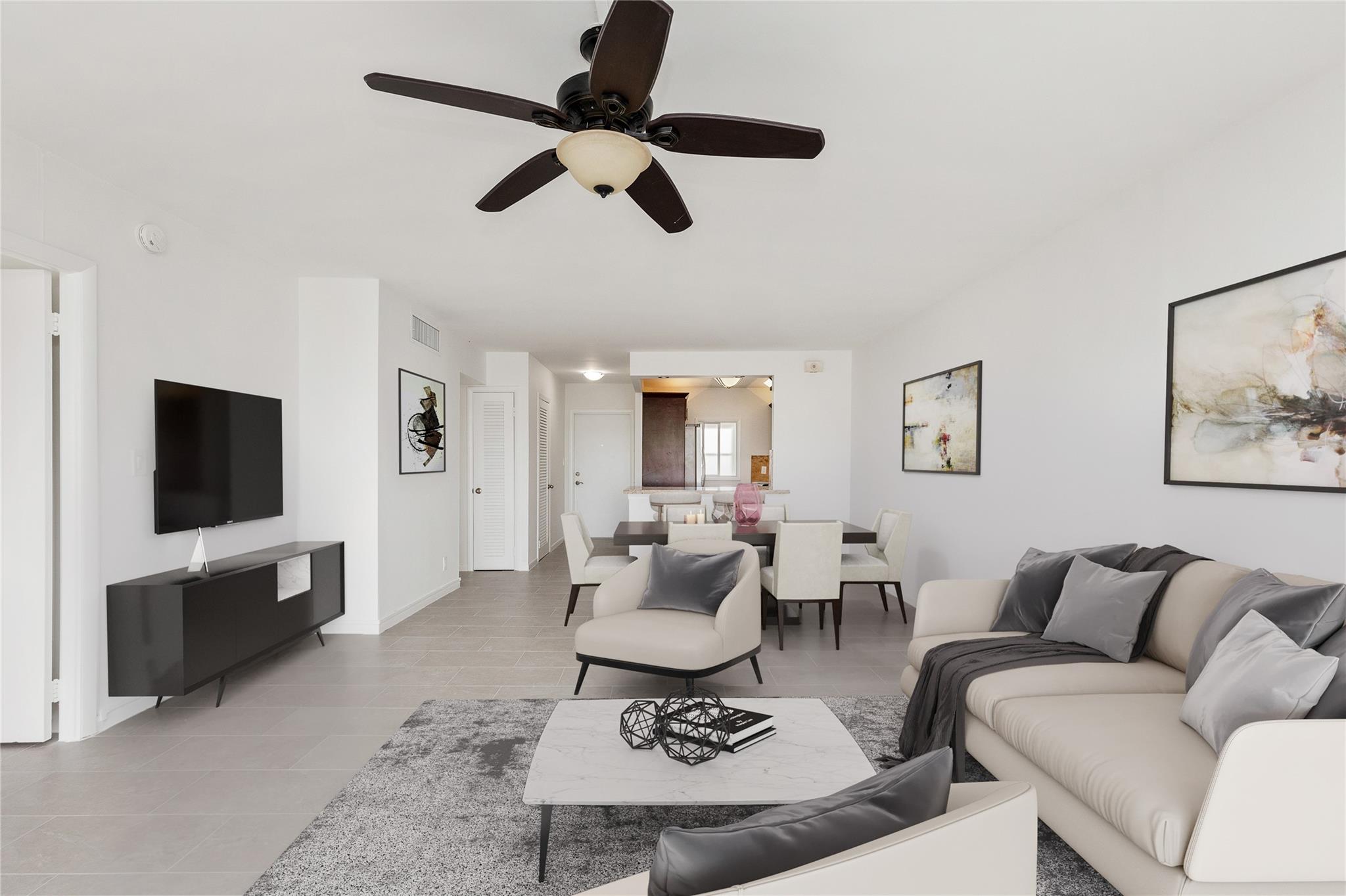 Virtually staged POV from balcony into living, dining, kitchen