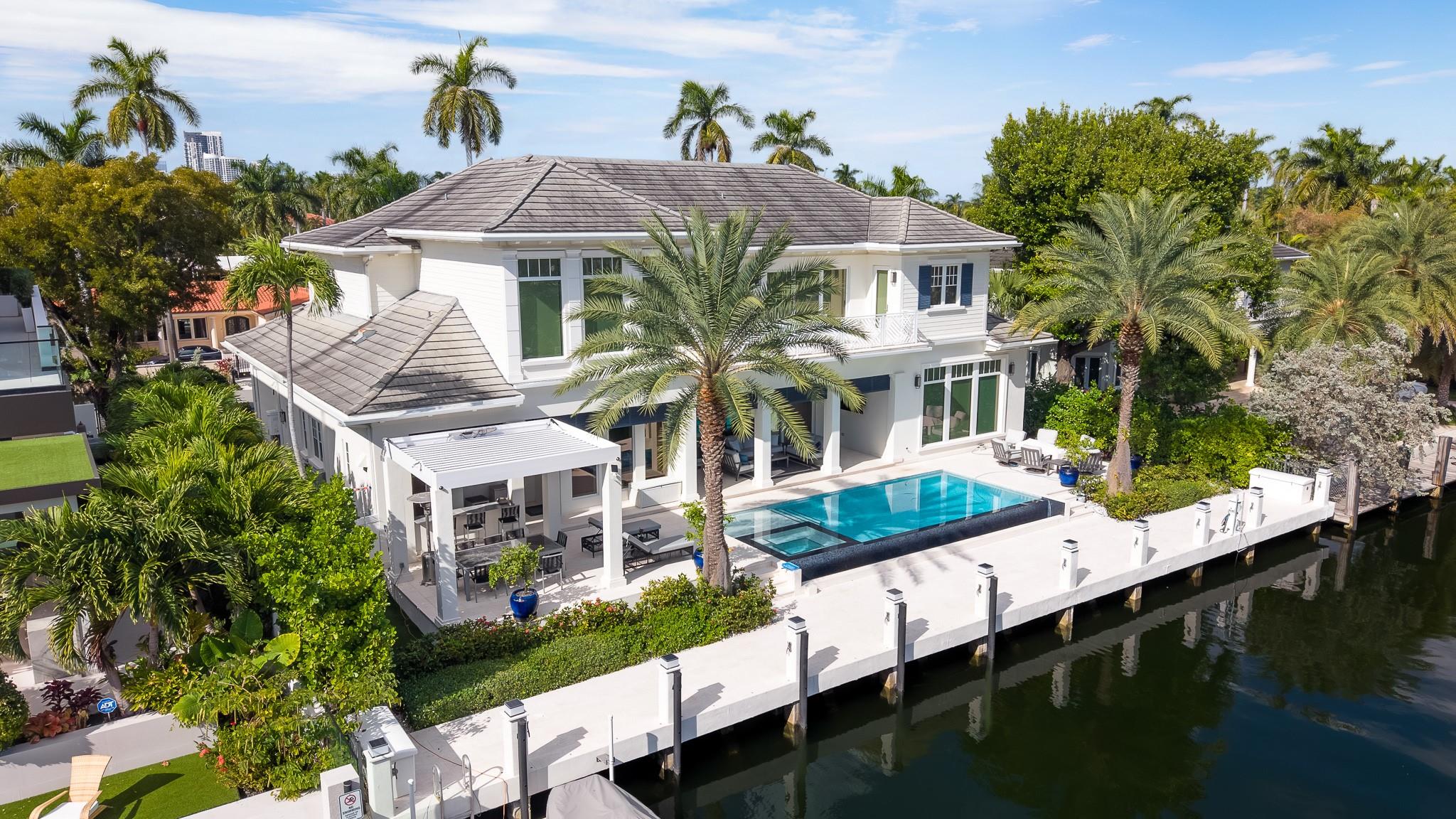 Enjoy waterfront views from your heated, saltwater pool.