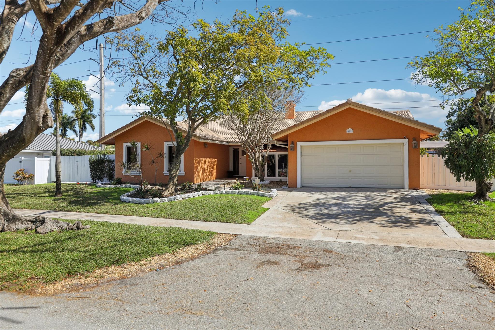 Spacious driveway and sizable front yard.