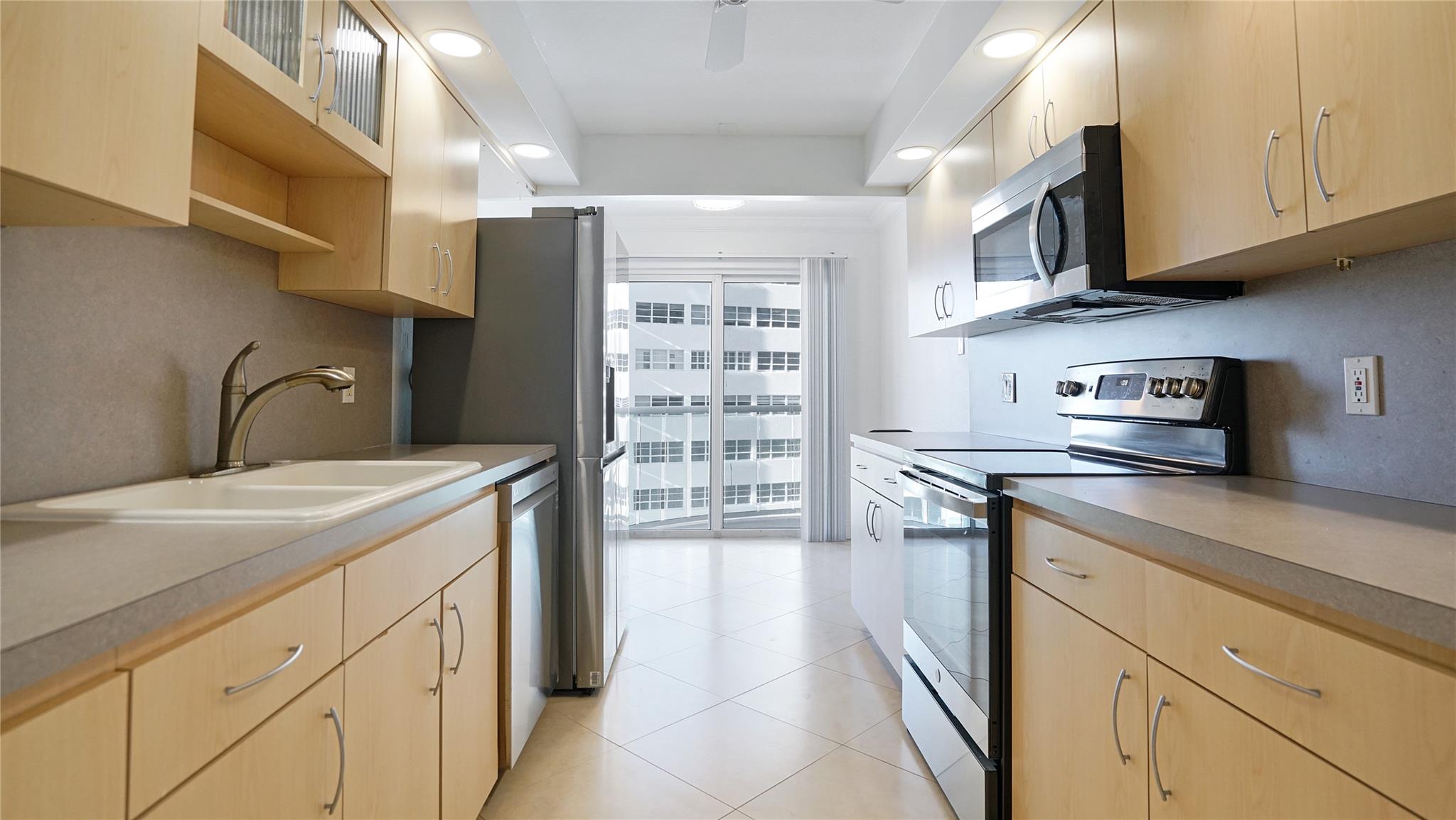 The sliding glass doors lead out to the balcony.