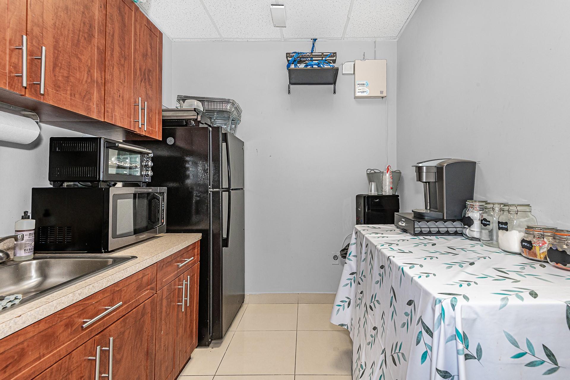 7301 Wiles Road 203, Coral Springs, FL 33067