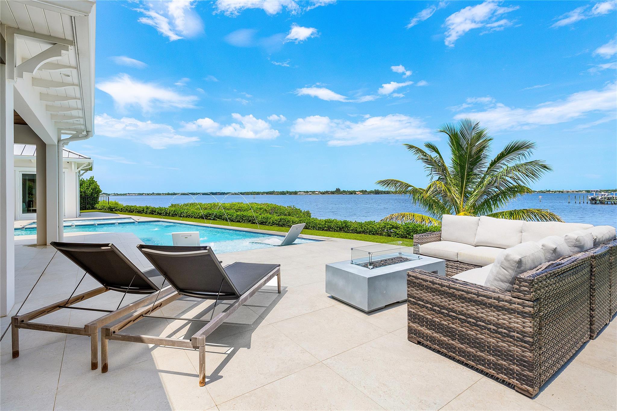 Riverfront sun bathing by pool