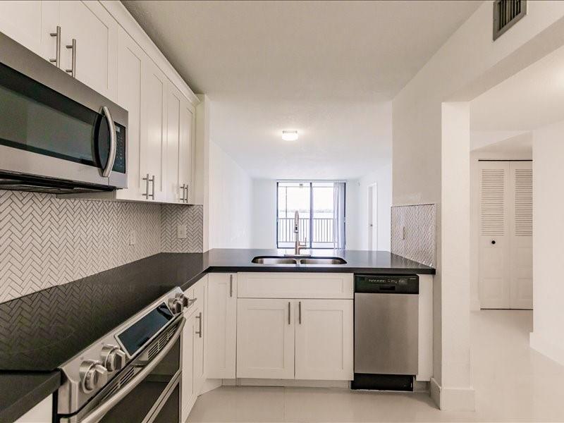 VIEW OF LAKE FROM KITCHEN