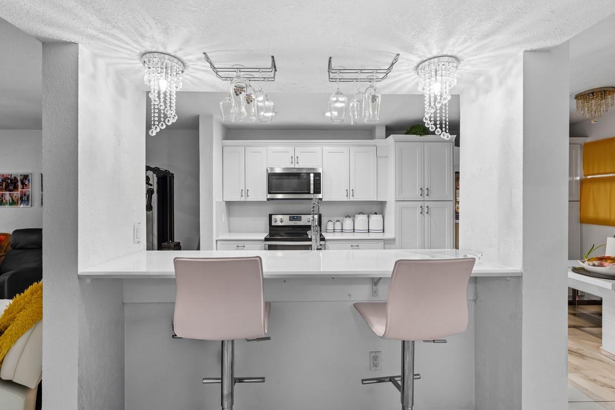 10762 La Placida Drive 7-107, Coral Springs, FL 33065