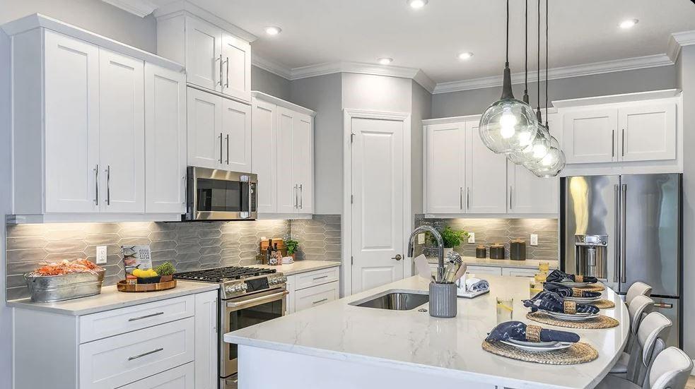 Additional highlights include: tray ceilings, additional bedroom with bathroom, pocket sliding glass door to outdoor living, study, rough-in plumbing for future outdoor kitch