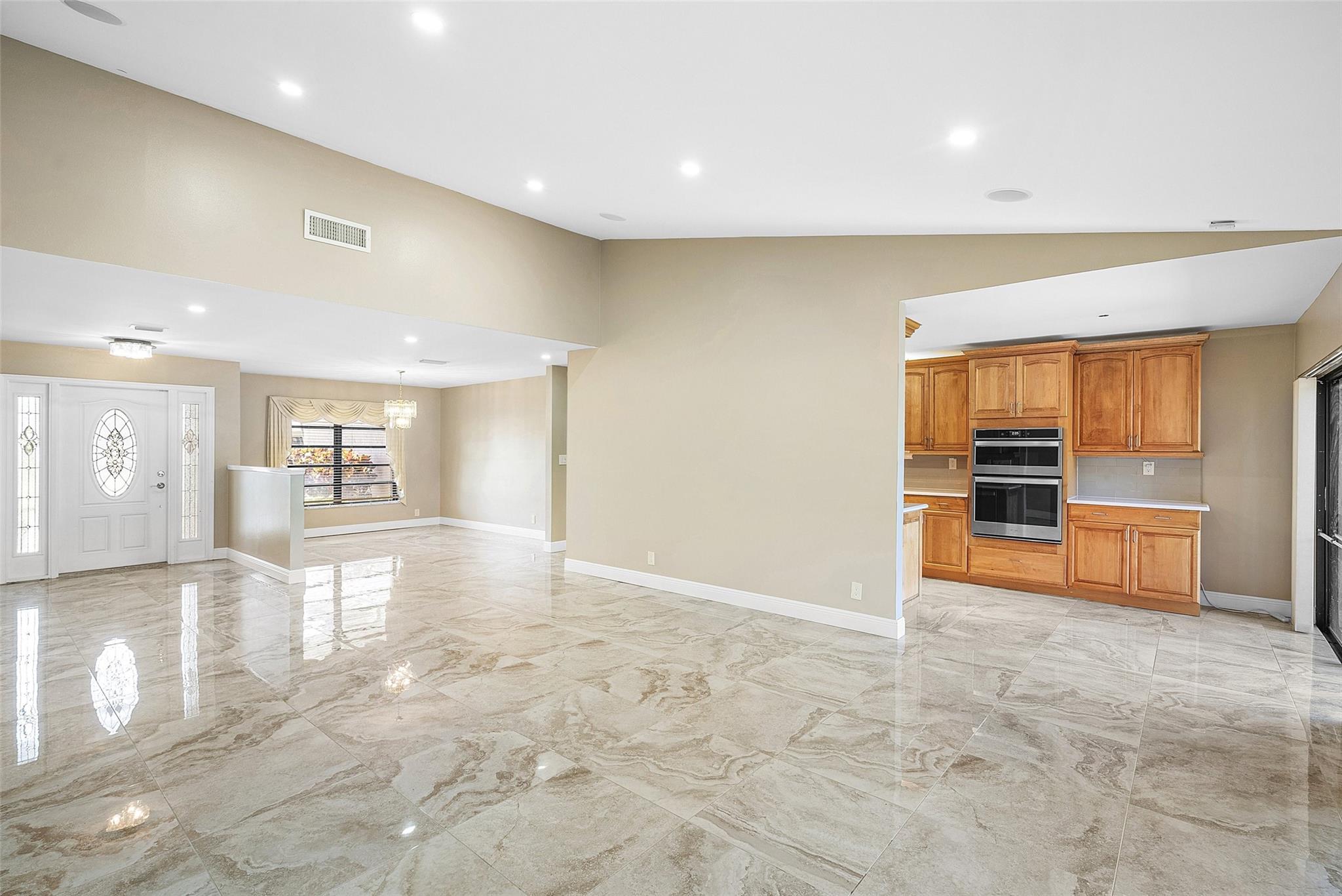Spacious open layout in Great room and updated kitchen cabinets and stainless steel appliance