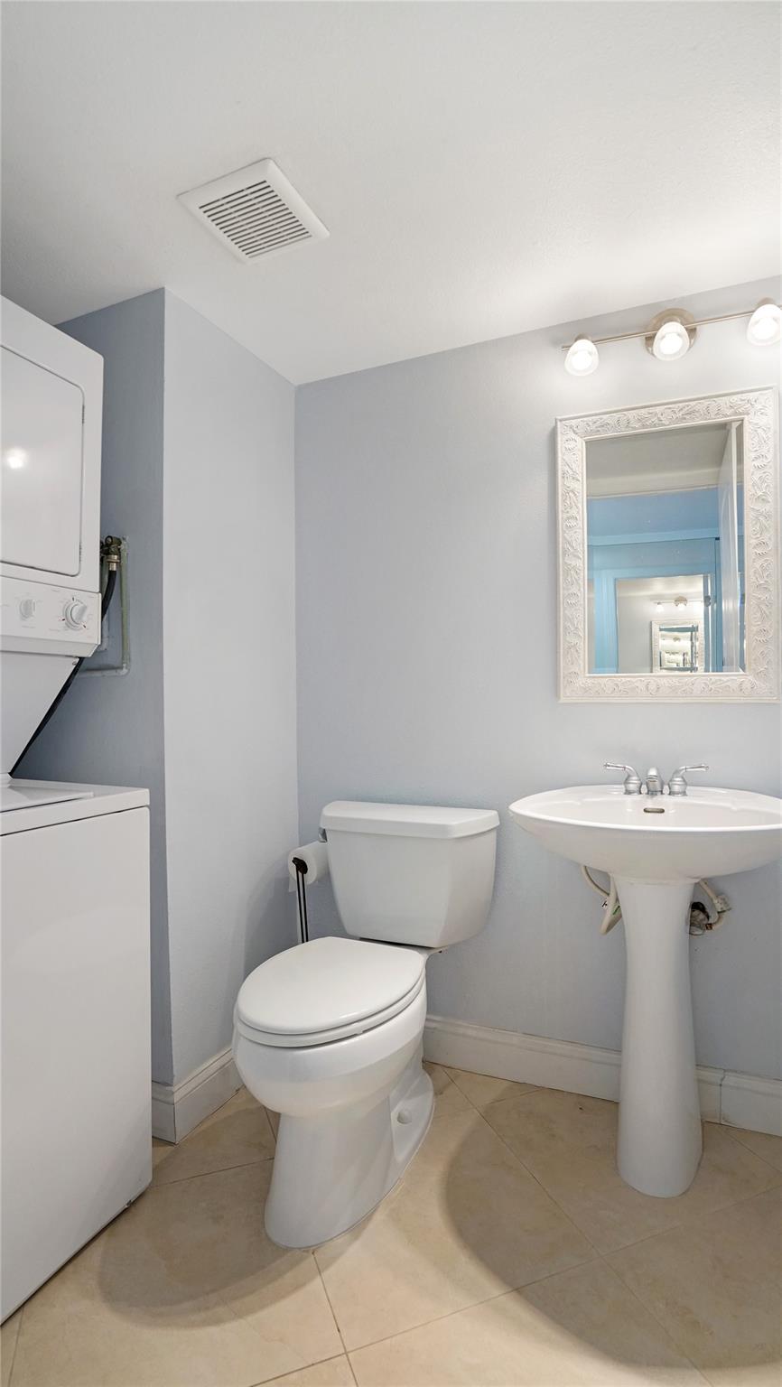 The washer and dryer is in the half bathroom.