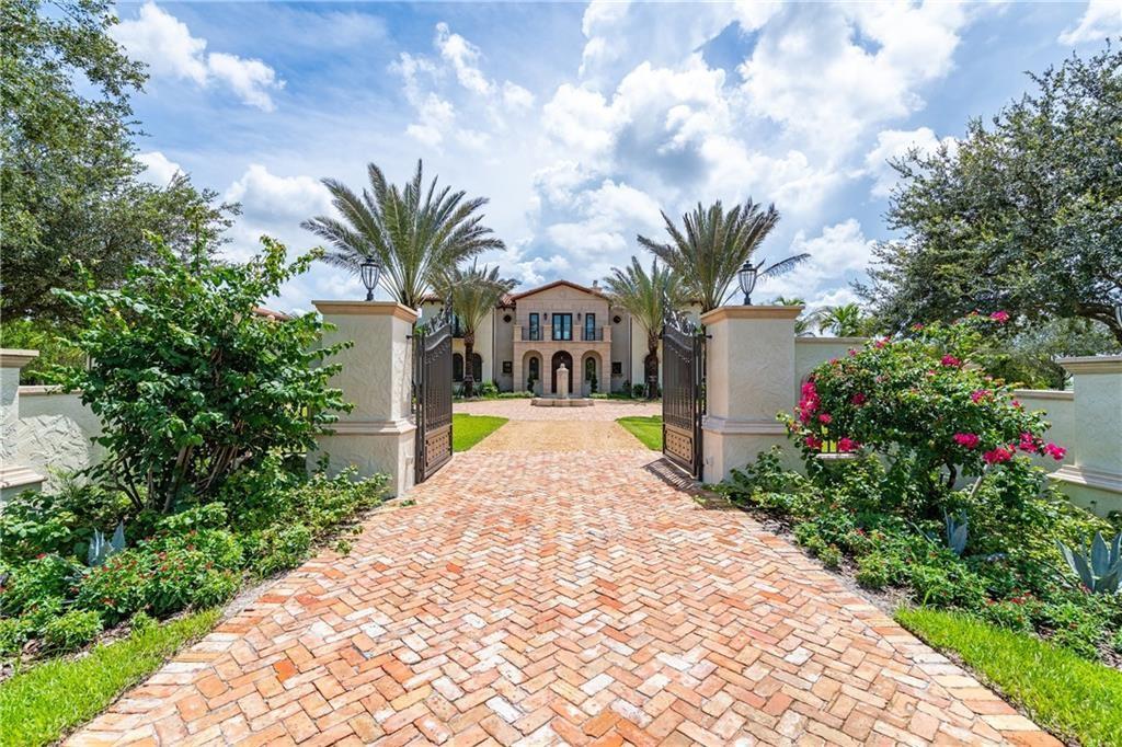 VIEW OF FRONT GATES AND ENTRY