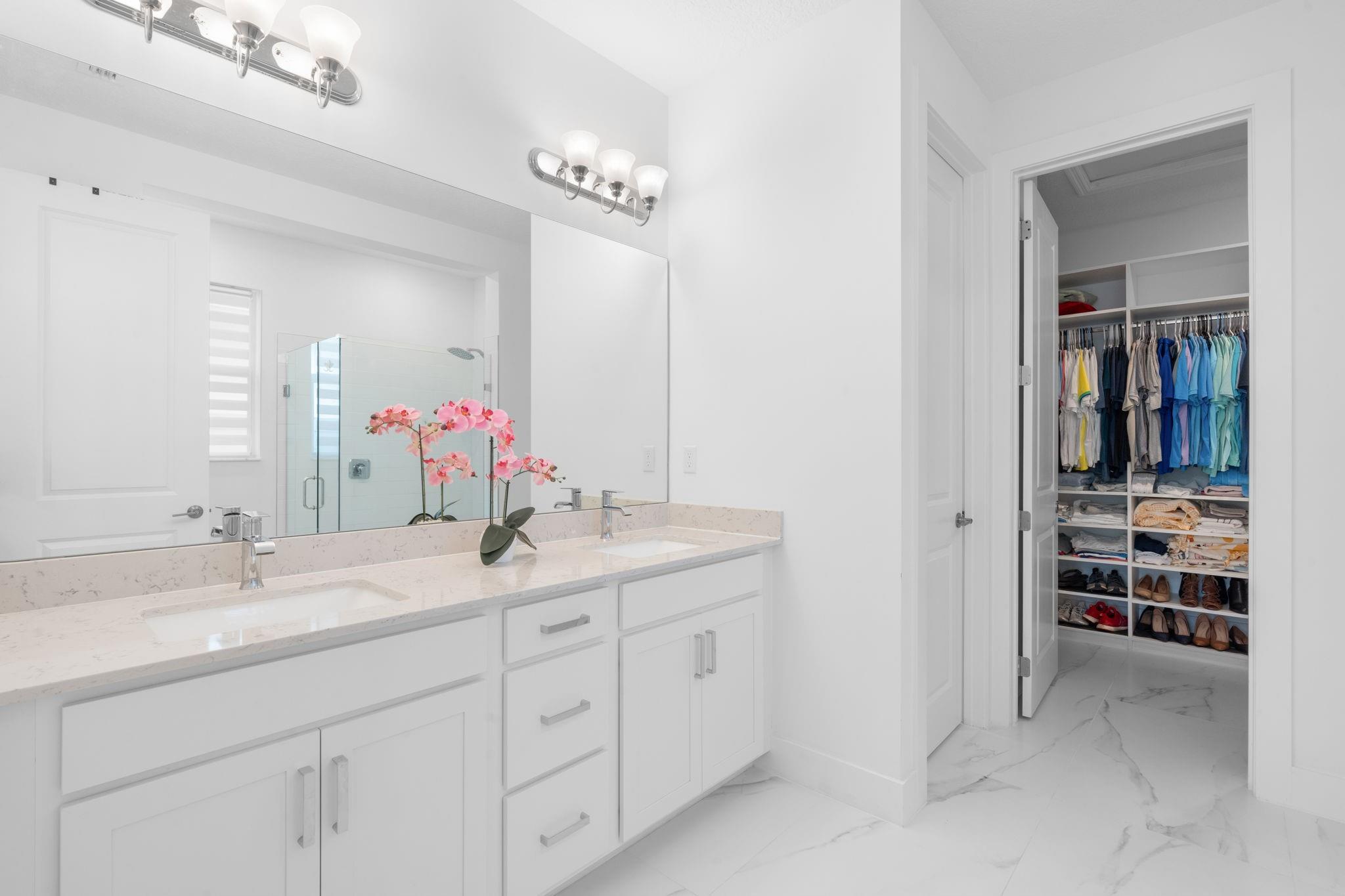 Large En Suite Double Vanity with Modern Quartz Counter Top and Porcelain Sinks