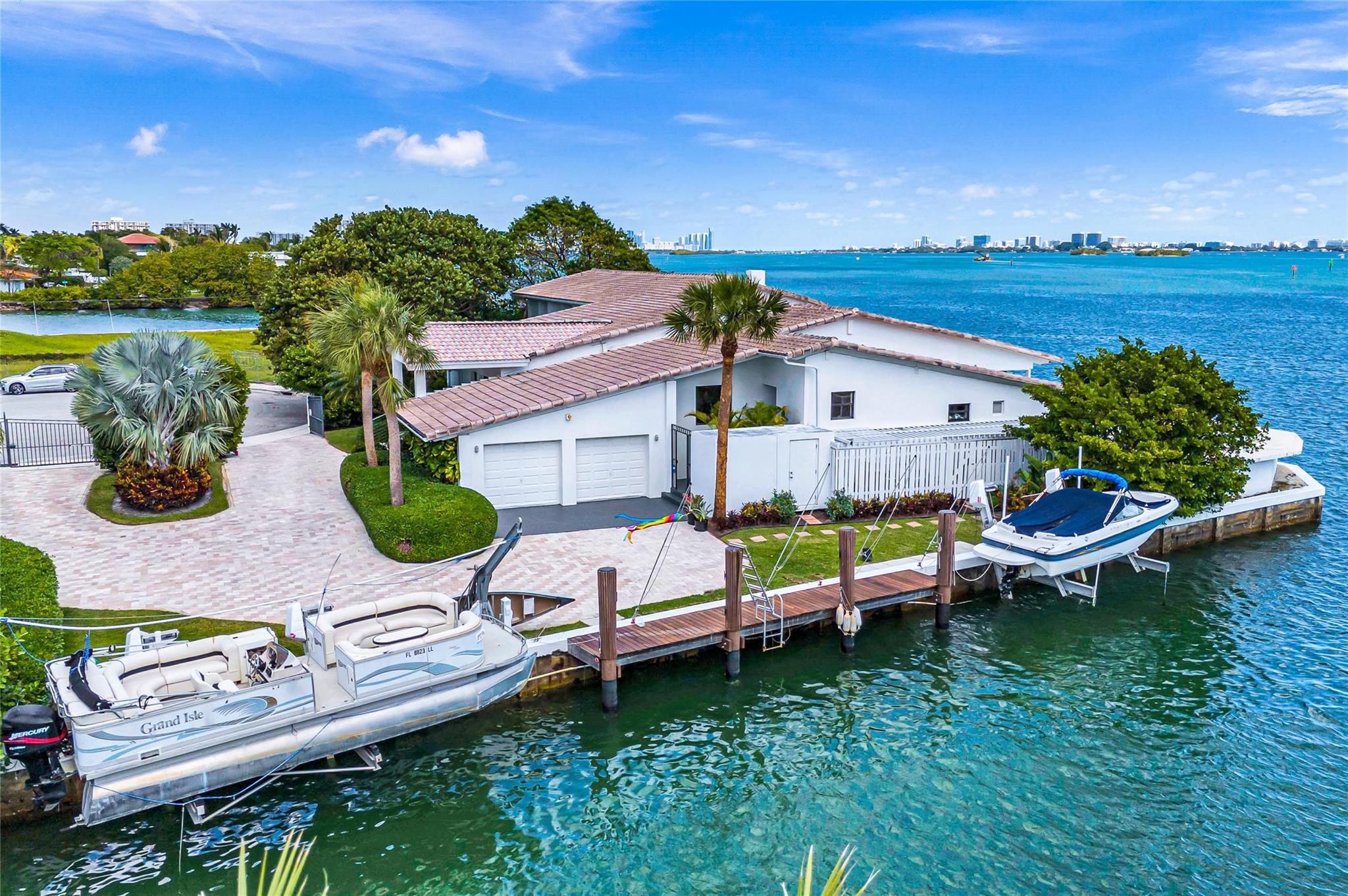 135 feet of side canal frontage with 33' dock and two boat lifts