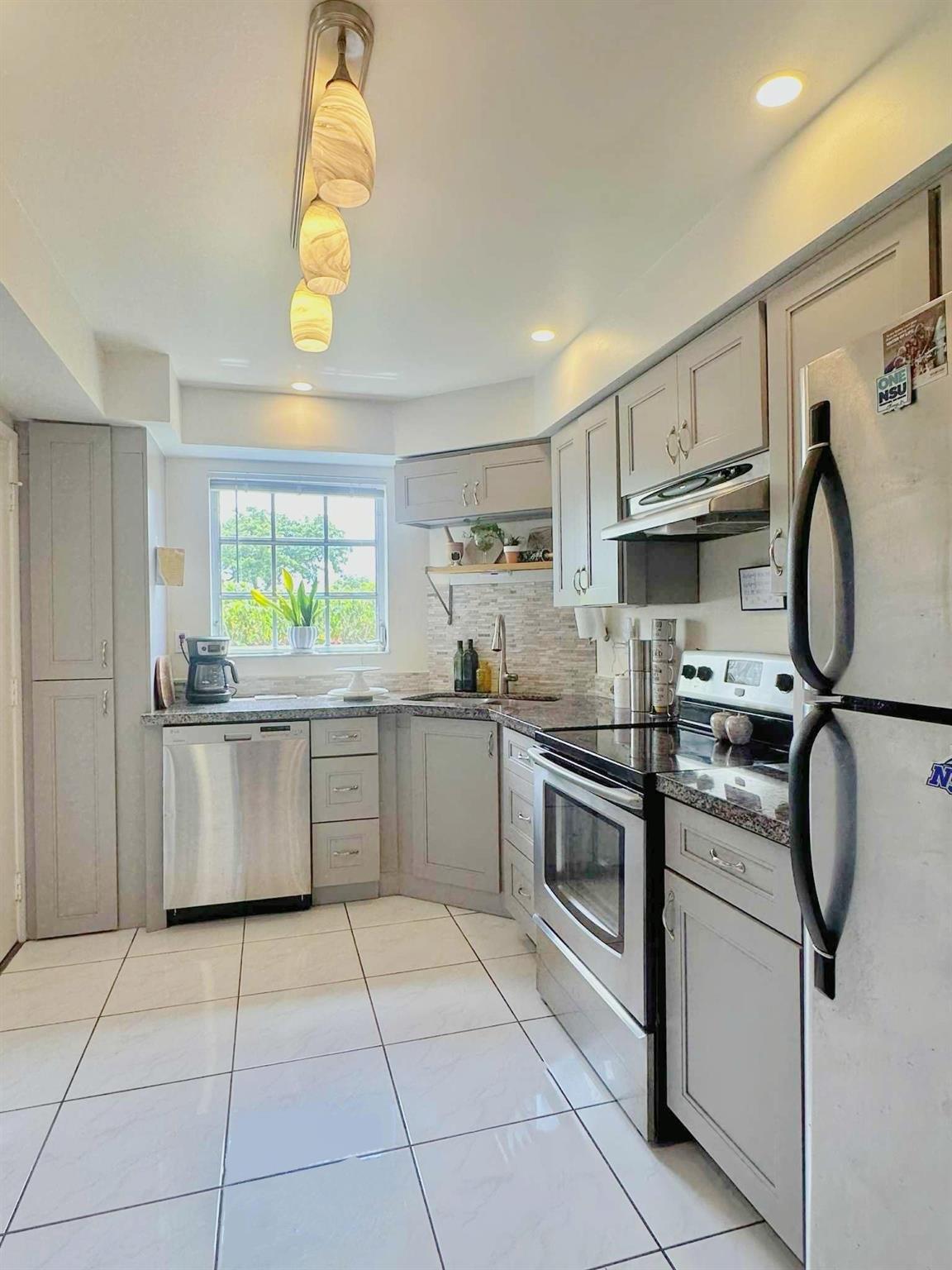 3475 Broken Woods Drive 101, Coral Springs, FL 33065