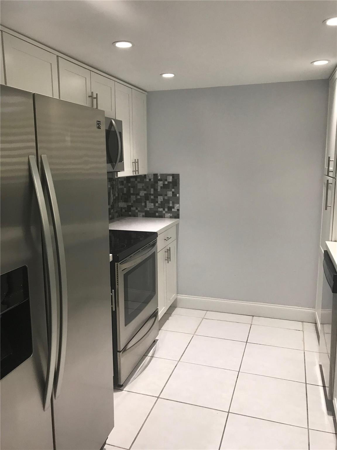 9576 SW 1st Court 9-F, Coral Springs, FL 33071