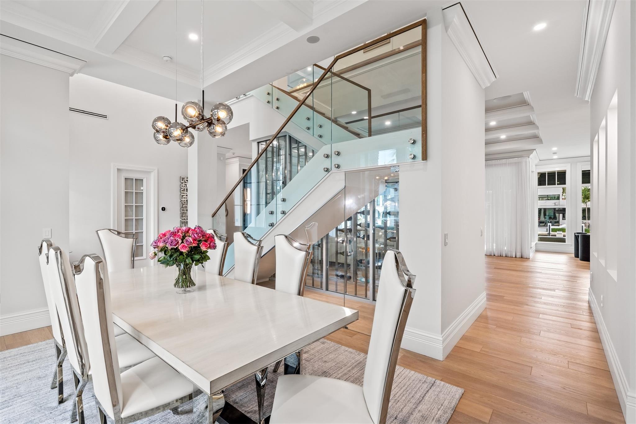 Large dinning room overlooking the wine cabinet.
