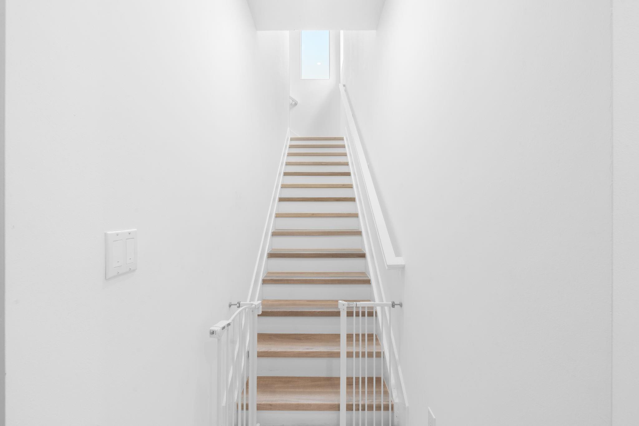 Stairs and and Second Floor Primary Suite have Beautiful Durable Vinyl. No carpet anywhere in the home.