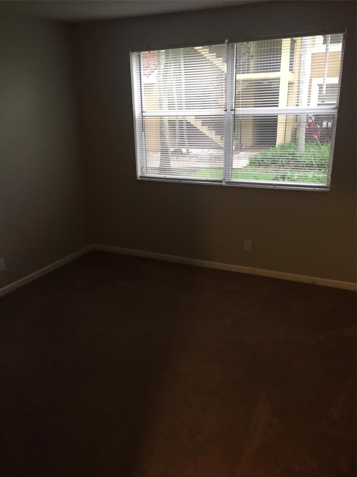 8721 Wiles Road 102, Coral Springs, FL 33067