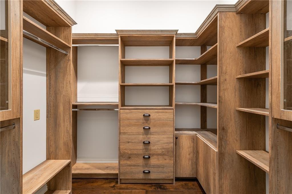 WALK-IN CLOSET IN MASTER BEDROOM
