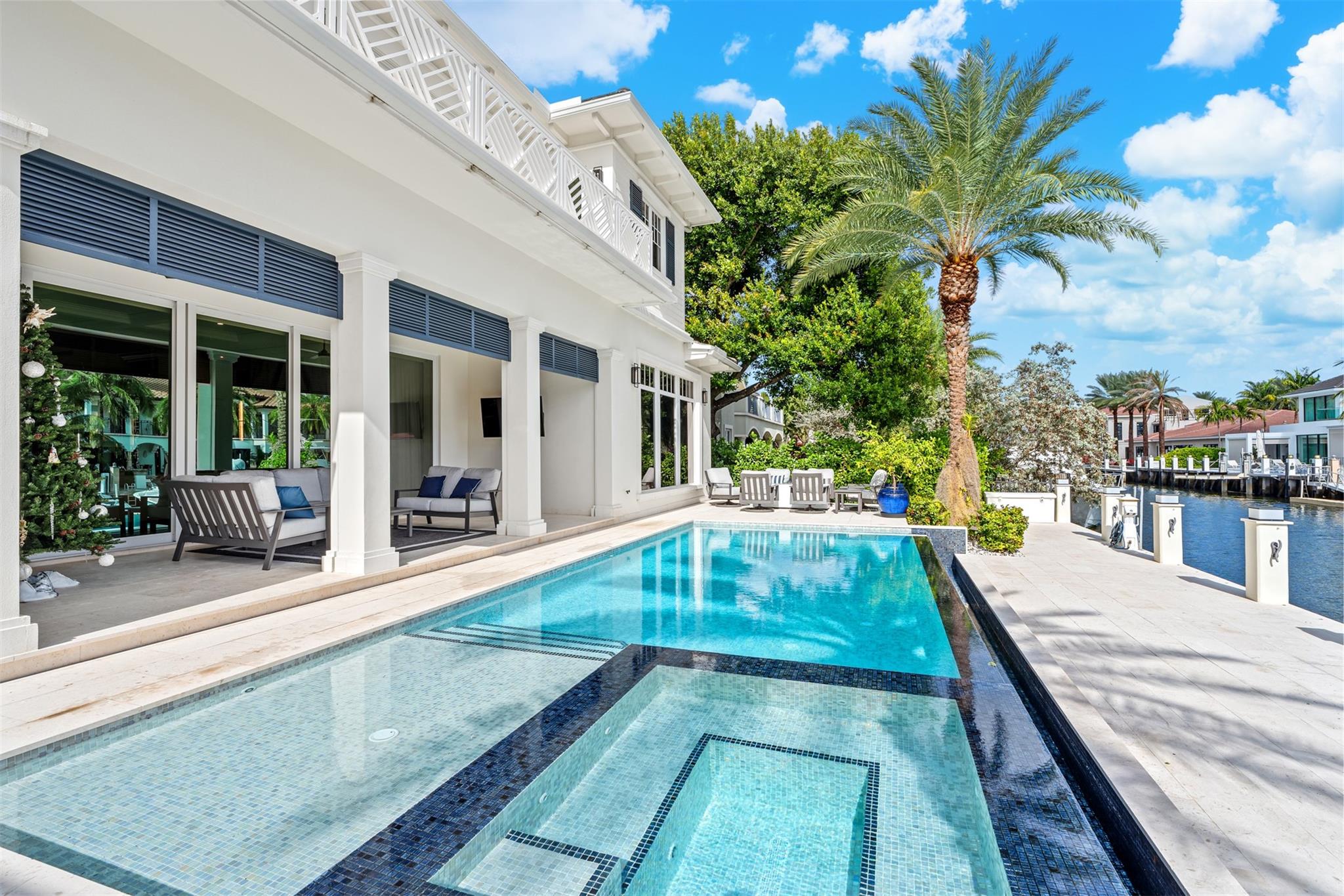 Enjoy waterfront views from your heated, saltwater pool.