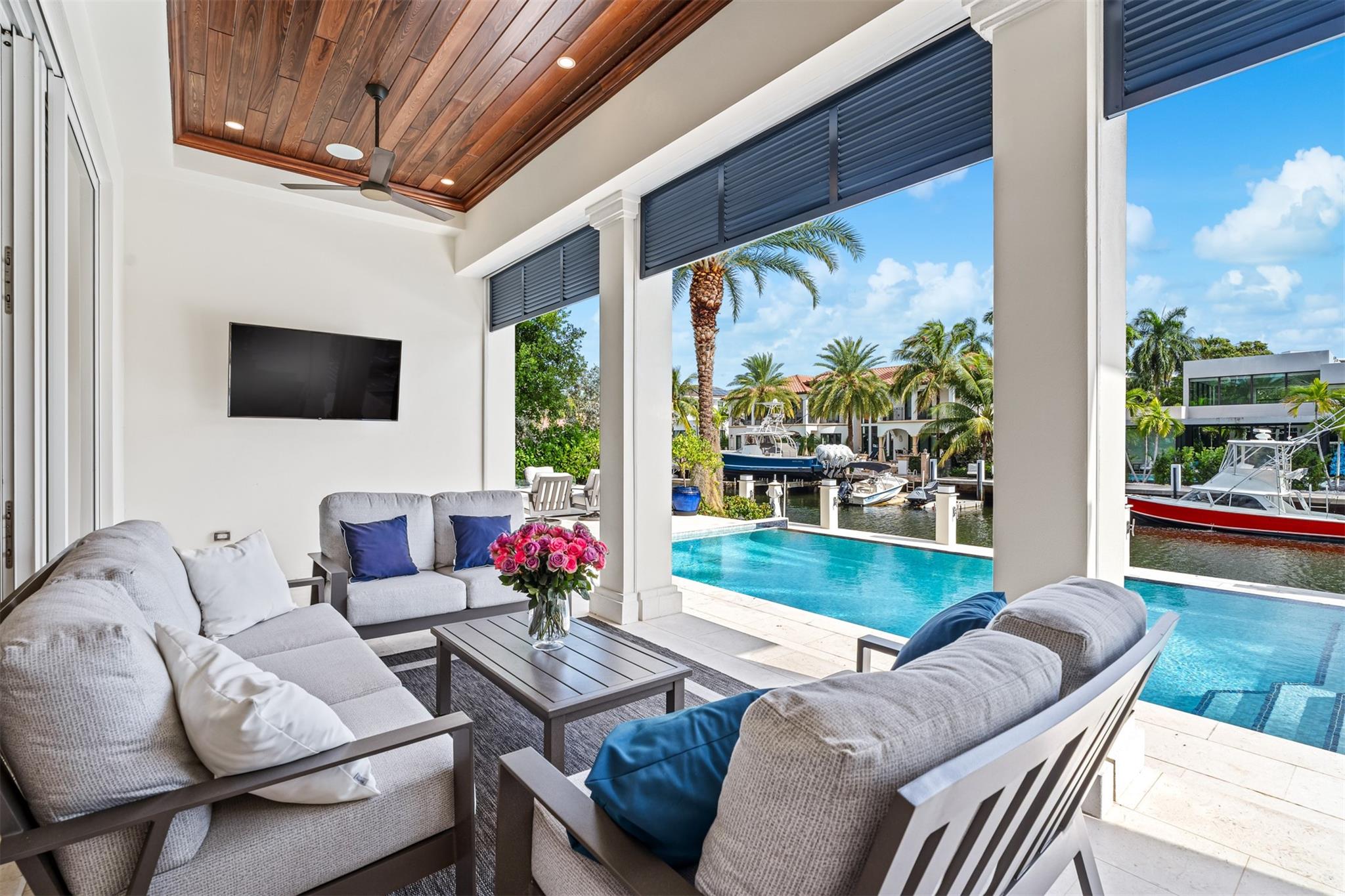 Covered, outdoor space. Perfect for days by the pool or relaxing and enjoying the waterfront views in the shade after a day of boating.
