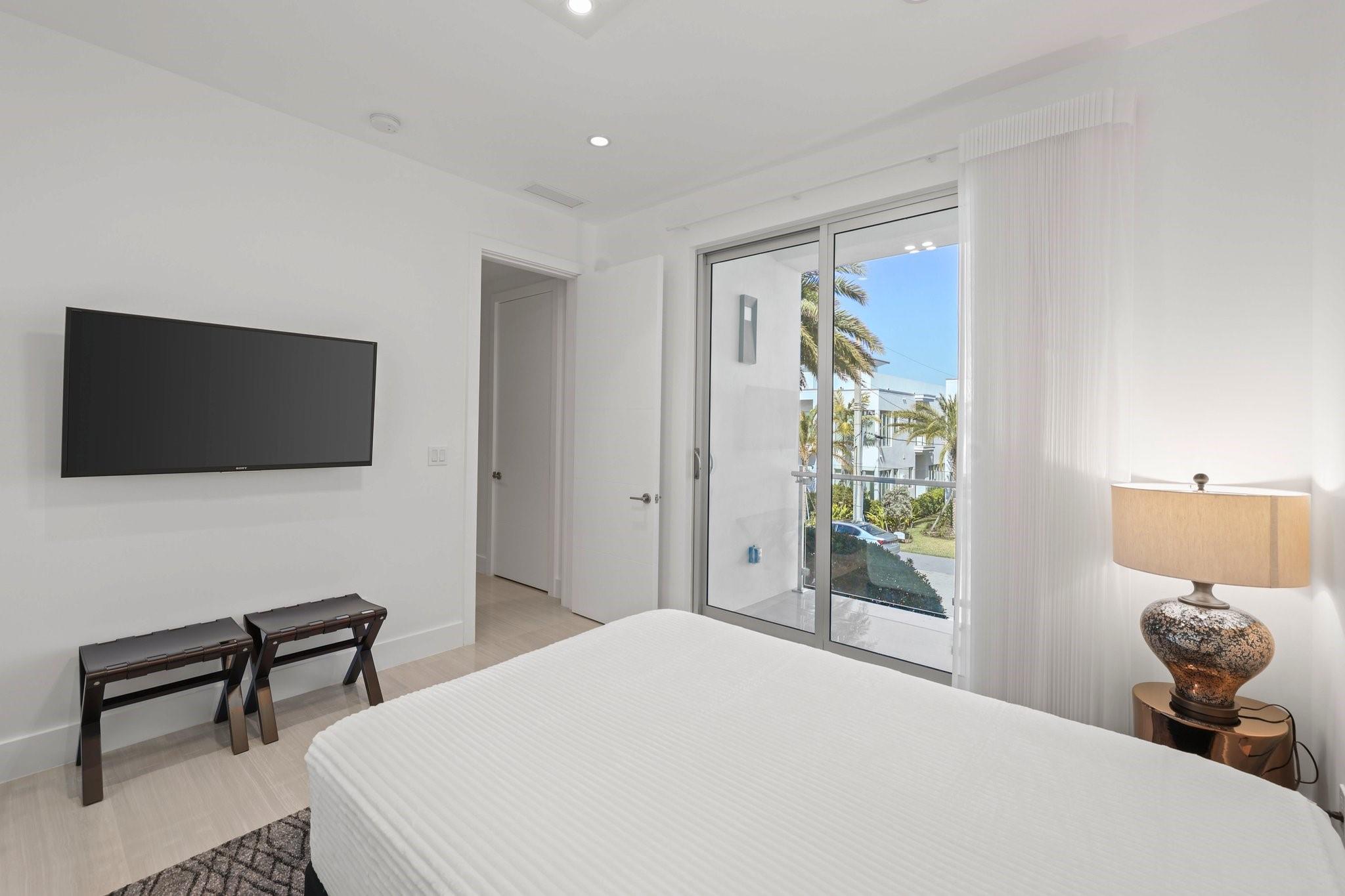 Fourth spacious ensuite bedroom with balcony