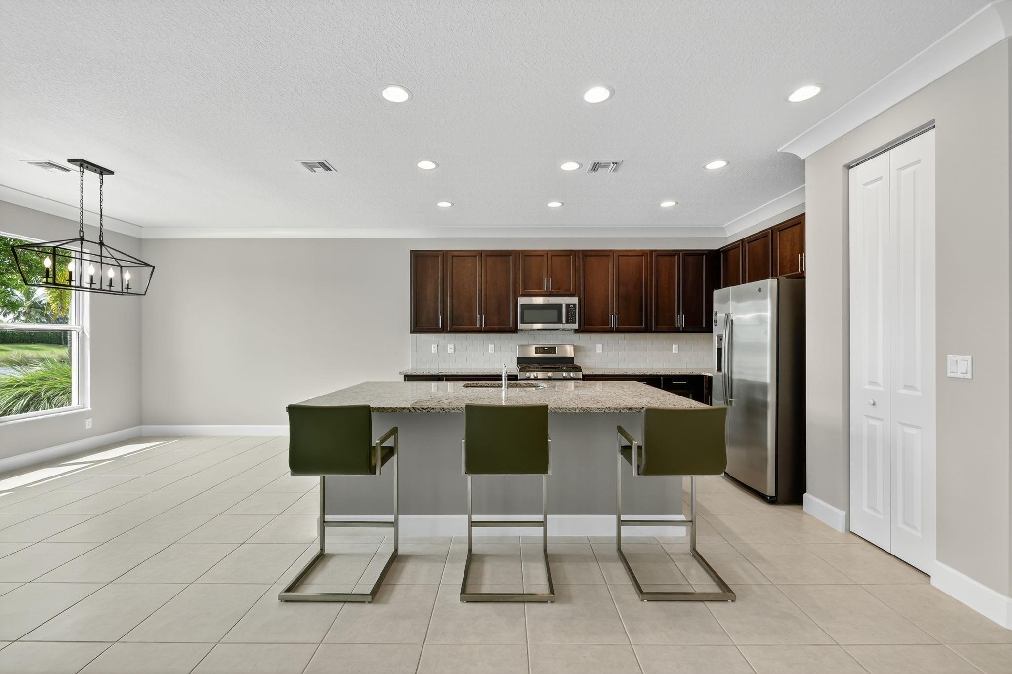 Spacious kitchen and large island.
