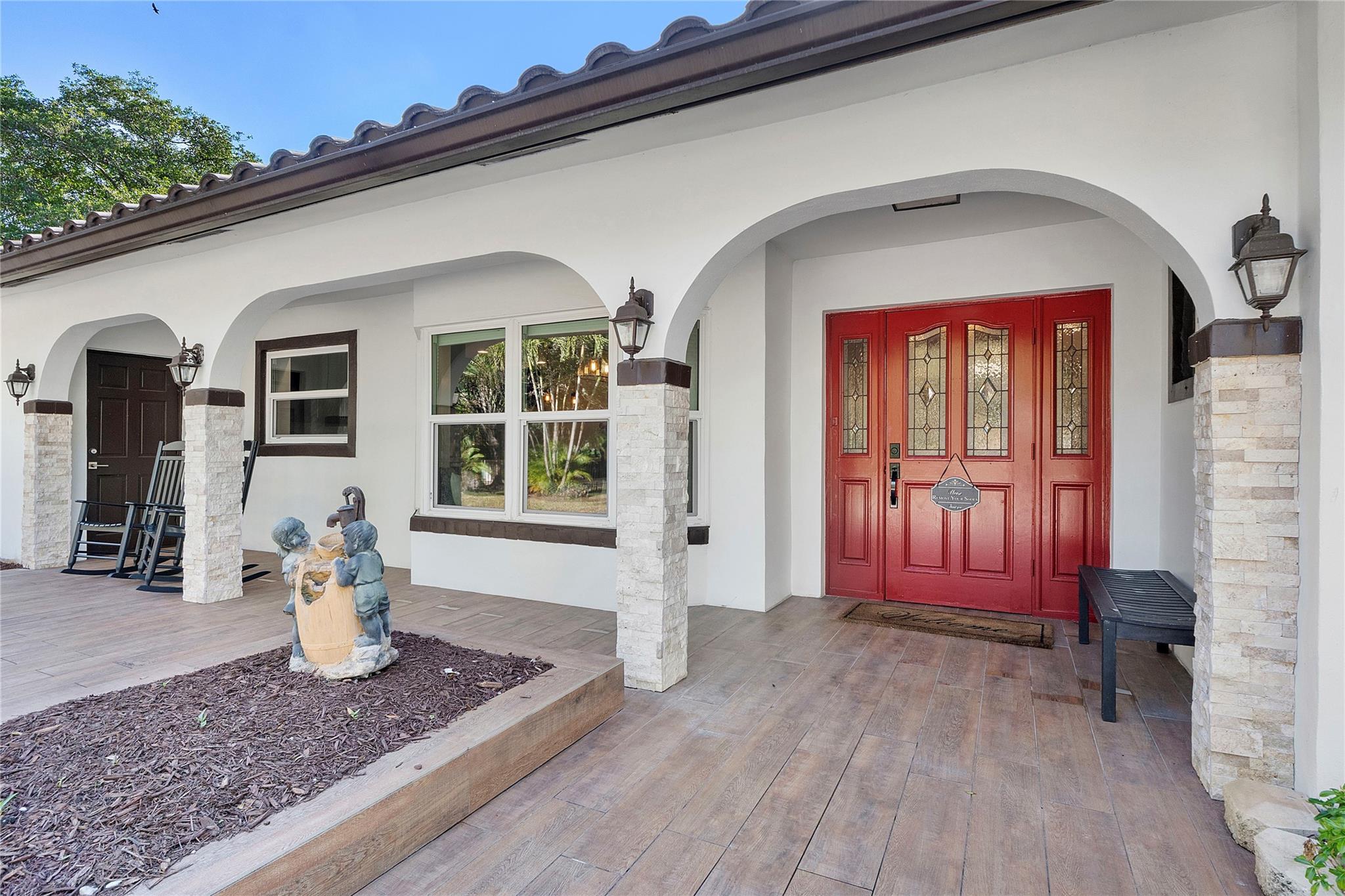 The front porchway, So inviting, The front garden also has a large area that is all fenced and gated, Its fun to watch the wildlife or your kids playing, great area for a baseball pitch.