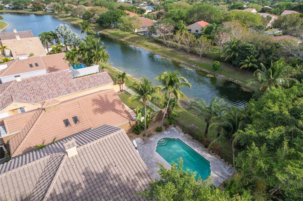 Photo for 6890 NW 75th Court, Parkland, FL 33067 - Listing #FX-10427148 private pool home positioned on canal in gated community.