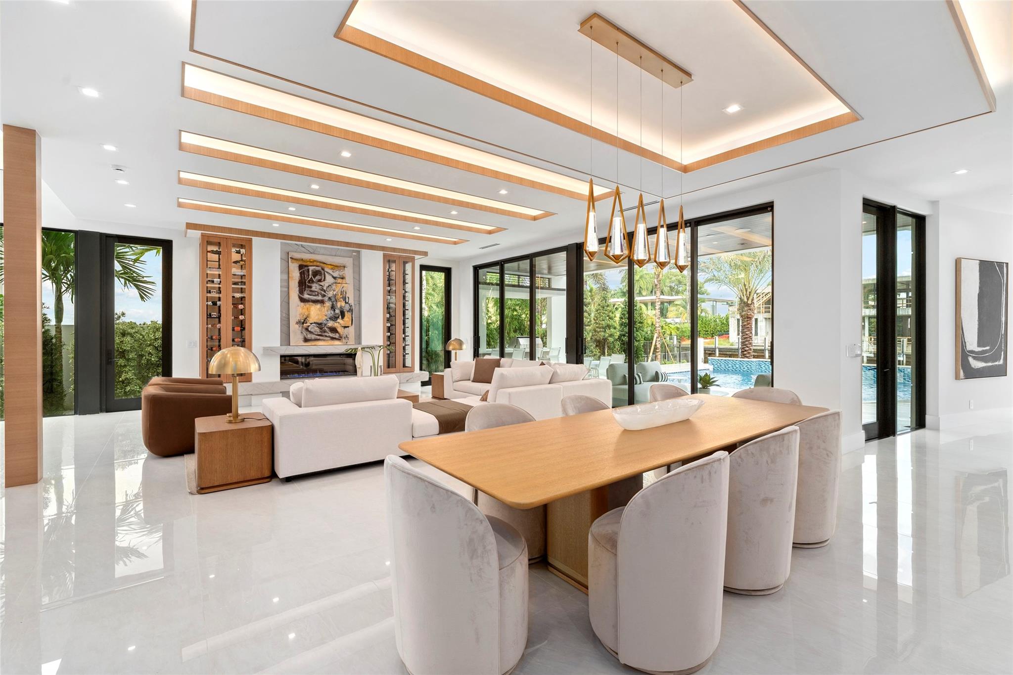 Rich finishes, custom millwork, and refined architectural details create a timeless ambiance. Just minutes from the ocean and downtown Las Olas,