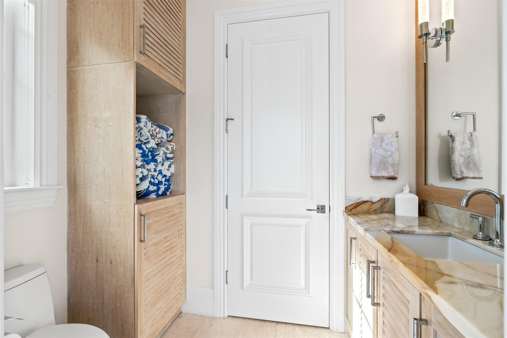 Cabana bath and laundry make for seamless pool days.