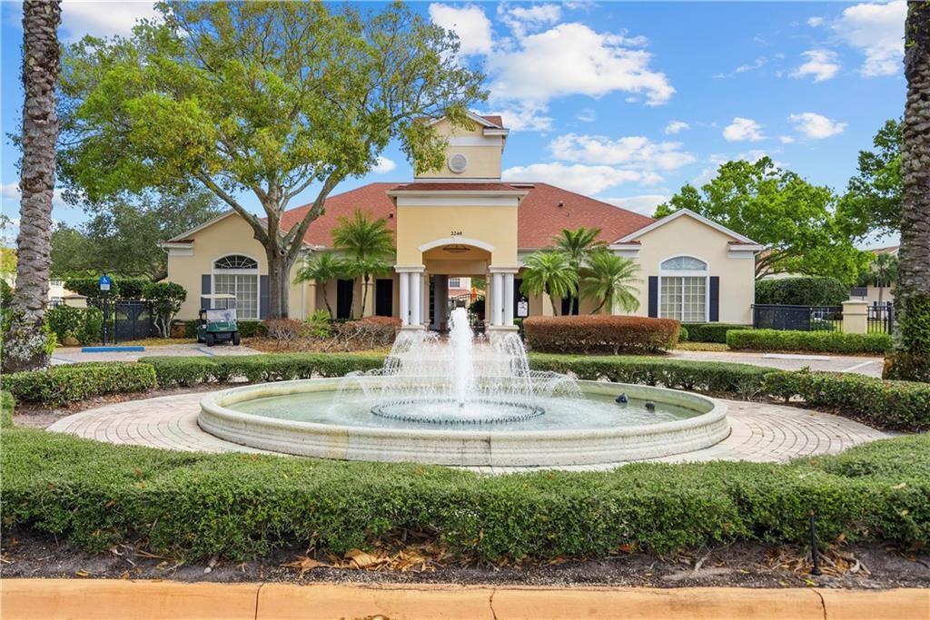 View of clubhouse with fountain