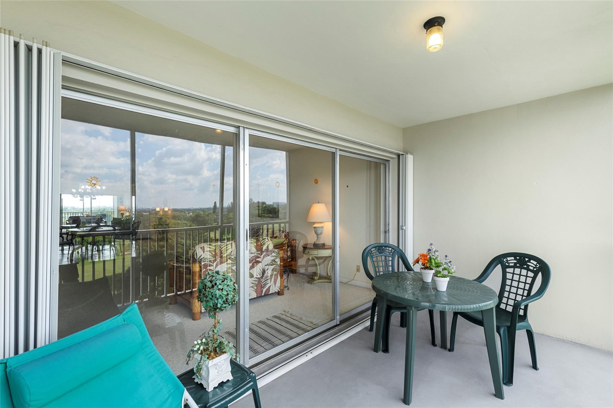 Photo for 3100 N Palm Aire Drive, 803, Pompano Beach, FL 33069 - Listing #FX-10522657 Notice the accordion hurricane shutters that slide smoothly.