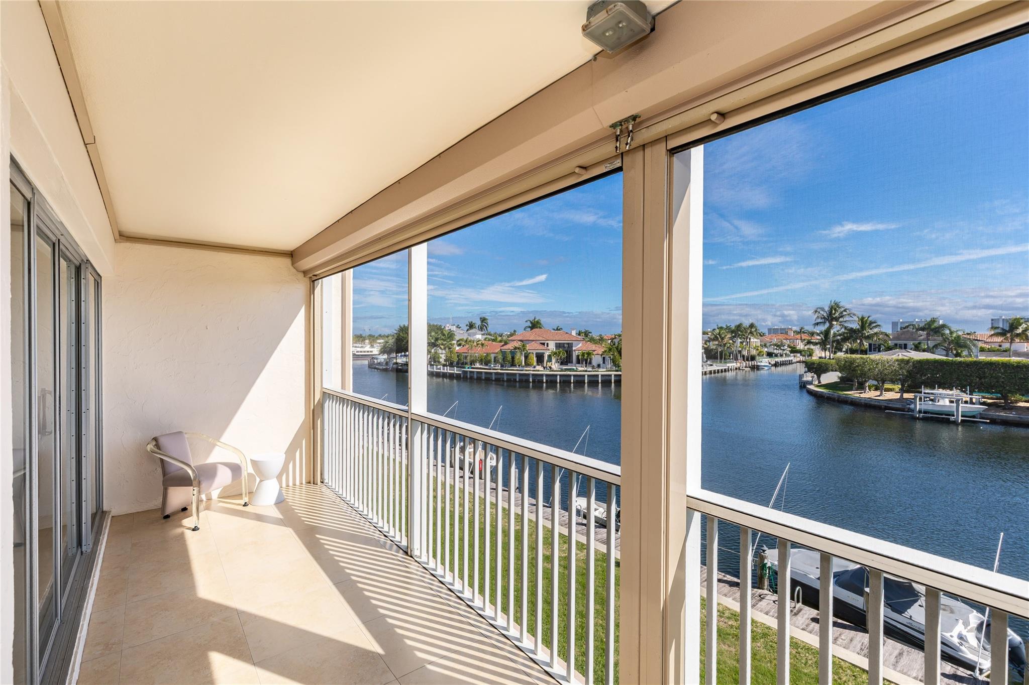 Balcony facing North toward the primary bedroom sliding doors.