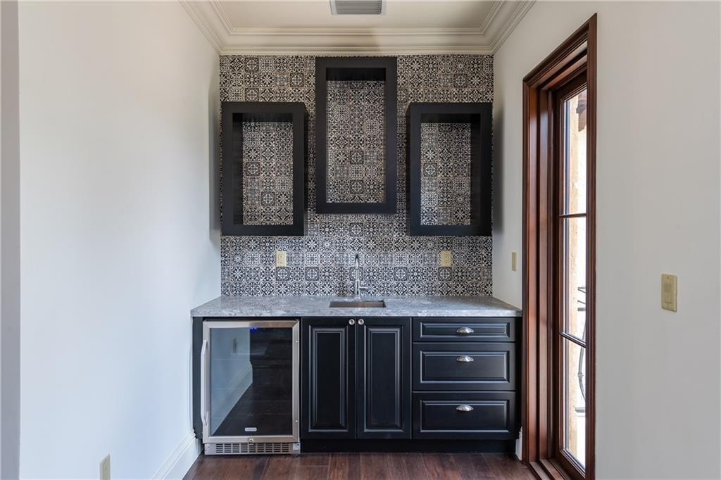 WET BAR WITH BEVERAGE REFRIGERATOR IN BALL ROOM