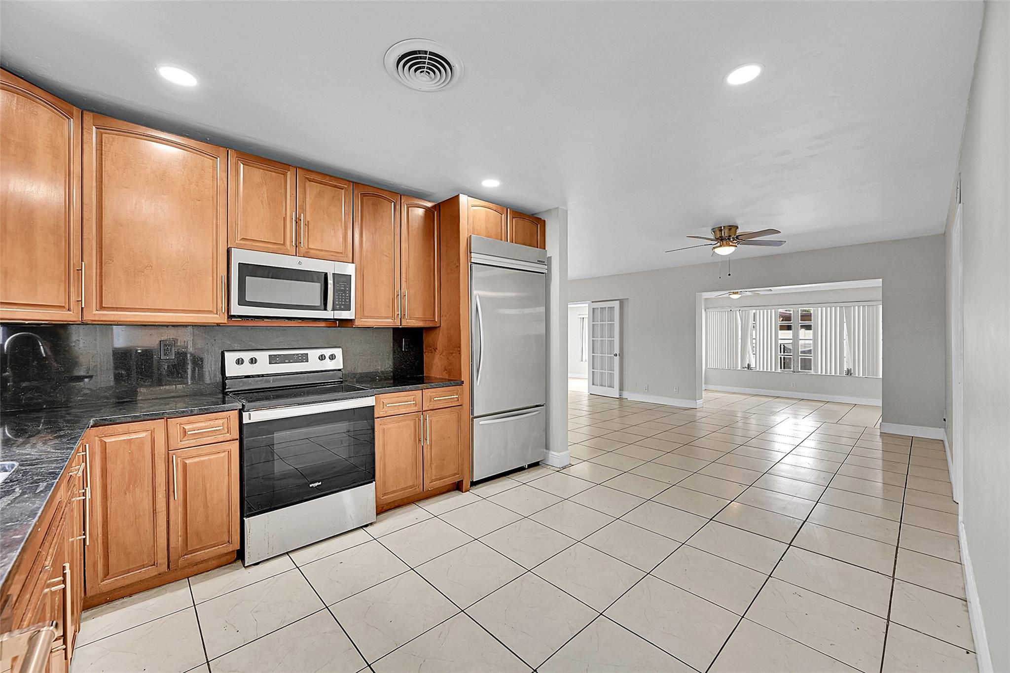 Photo for 6602 NW 9th Street, Plantation, FL 33317 - listing #FX-10534680 Deluxe Appliances, Open to Living Area, Everything to Love, Including Chef's Preparation Annex with More counters and Cabinets