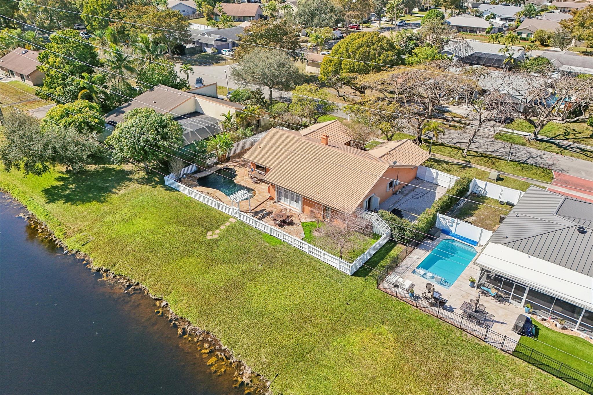 Home located in Plantation Hills neighborhood on the water.