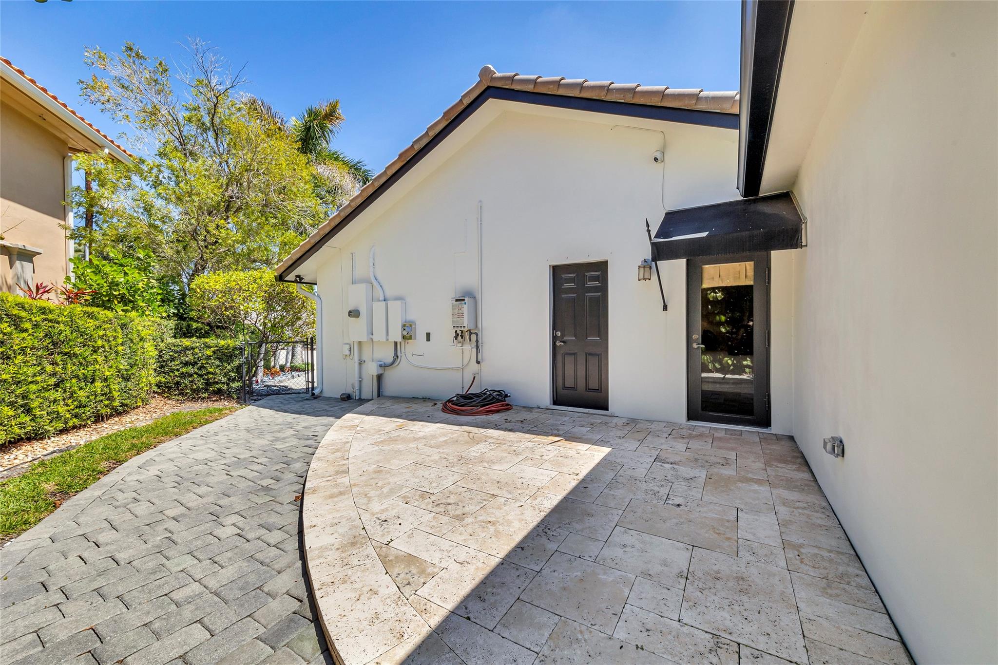 North side if residence with spacious side yard patio area