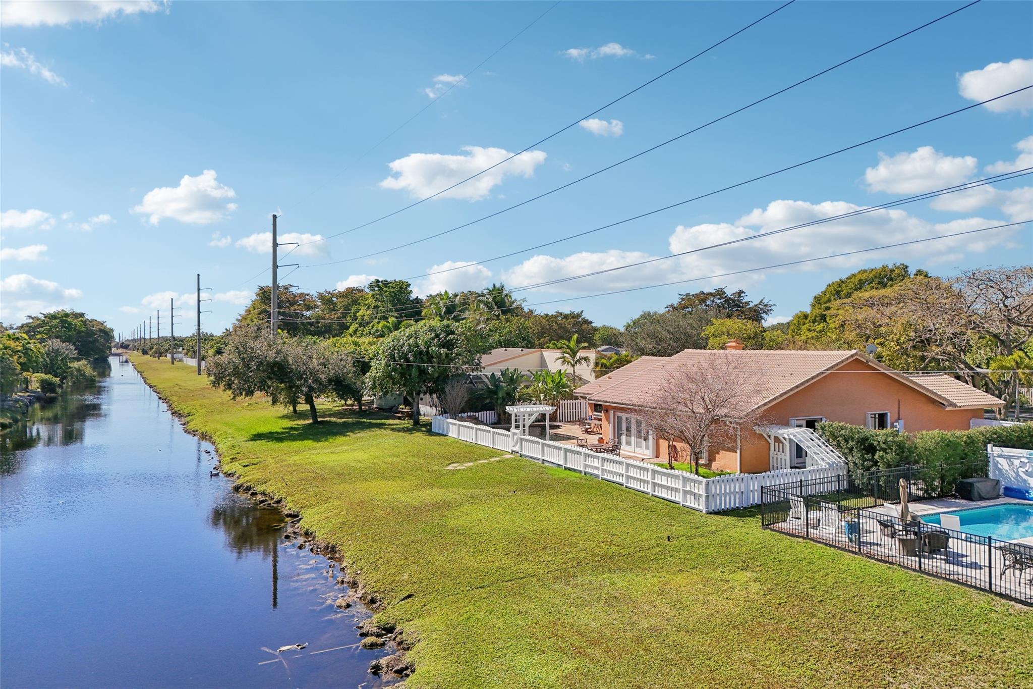 Home located in Plantation Hills neighborhood on the water.