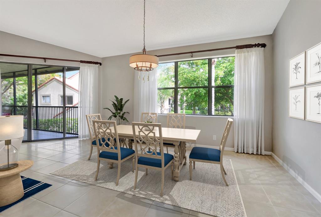 Photo for 5801 Coach House Circle, Unit E, Boca Raton, FL 33486 - Listing #FX-10436780 Dining area overlooks the lake and flows to screened balcony. Perfect for parties!