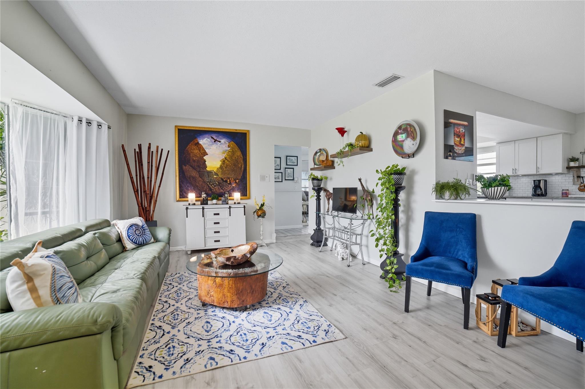 Sunny Living room with waterproof vinyl tile flooring