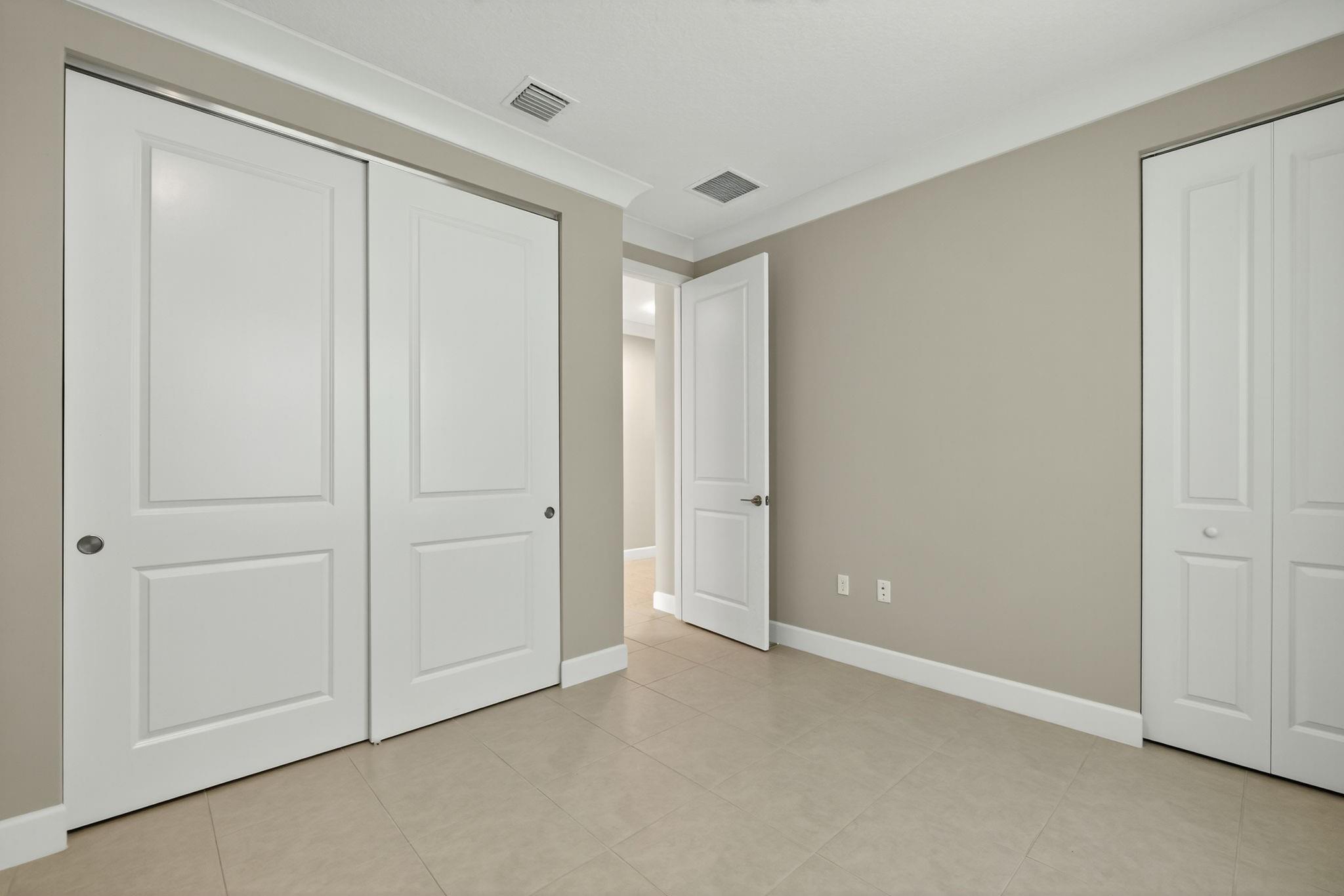 Actual 3rd bedroom with wall length closet.